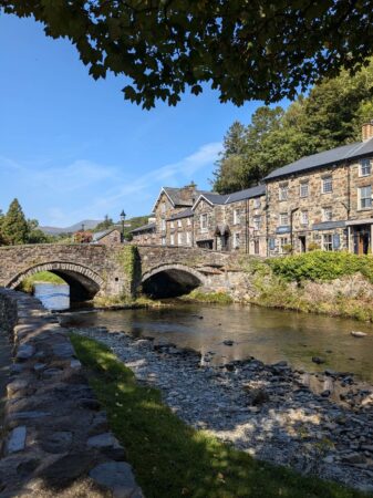 Beddgelert village centre with the bridge over the River Glaslyn