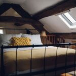 Crog loft double bedroom with chest of drawers and wardrobe