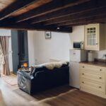 Kitchen and sitting area in Ty Hebog holiday cottage