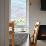 Dining area and electric fire - the lodge also includes full central heating