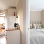 Kitchen and twin bedroom next to each other